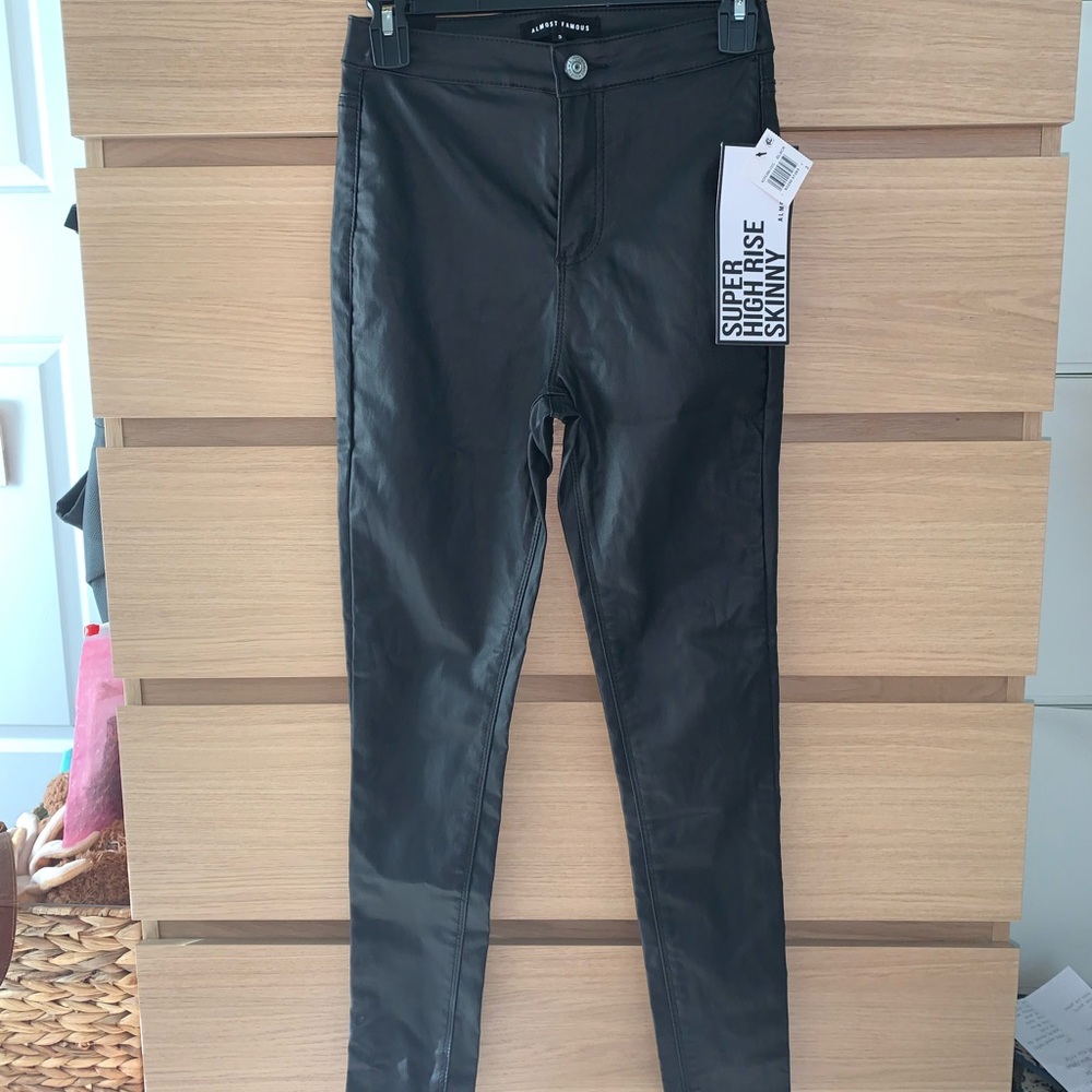 Almost Famous High Rise Coated Skinny Jeans